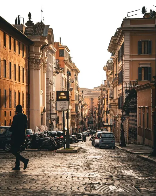 Captivating urban street scene in Rome's historic district during day, showcasing classic architecture.