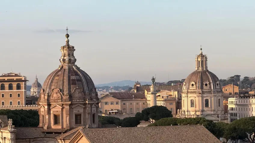 Captivating view of Rome's iconic domes and architecture in the gentle morning light.