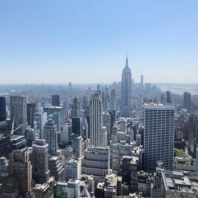 A breathtaking aerial view capturing the iconic New York City skyline with the Empire State Building.